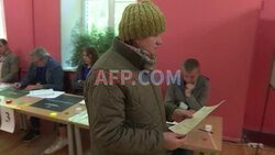 Lithuanians vote in first round of presidential election - AFP