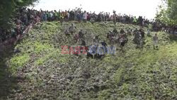 Cheese chasers launch down hill in annual British race - AFP