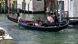 *EXCLUSIVE* WEB MUST CALL FOR PRICING  - Mexican Boxing Champion Saul 'Canelo' Alvarez packs on the PDA on a romantic gondola ride in Venice with wife Fernanda Gomez.