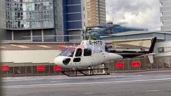 *EXCLUSIVE* American actor Tom Cruise looks in great spirits as he's pictured posing for selfies with fans as he arrives on his helicopter at Battersea helipad after a day trip to Oxford.