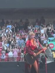 Taylor Swift chokes on a bug as she sings at Wembley stadium London.