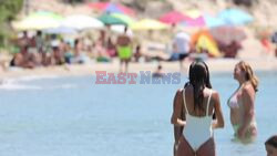 *EXCLUSIVE* Bianca Balti and Melissa Satta show off their stunning figures in their skimpy swimwear during a playful day out at the beach in the hot sunshine of Sardinia.