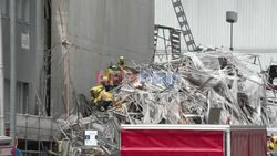 Emergency services at the scene of deadly Lausanne scaffolding collapse - AFP