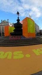 Yinki llori MBE with his vibrant installation at Piccadilly Circus this morning