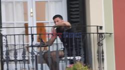 *EXCLUSIVE*  - Strictly come Dancing pro dancer Giovanni Pernice chills on the balcony of his hotel in Portofino