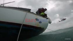 Incredible Moment Man And His Dog Are Rescued From The Sea During Hurricane Helene