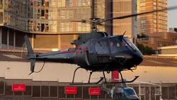 *EXCLUSIVE* Hollywood legend Tom Cruise yawns after landing at London Battersea Heliport before he was overheard saying to heliport marshal "it was a good day today" flying in from Pinewood Studios