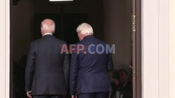 US President Biden welcomed by German President in Berlin - AFP