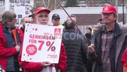 Biggest German trade union calls warning strike over pay - AFP