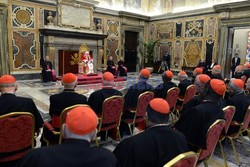 Pope Benedict XVI delivering a speech to cardinals 