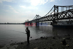 Chińskie miasto Dandong na granicy z Koreą Północną - AFP