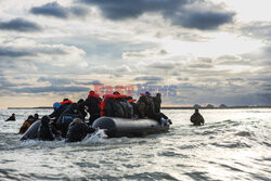 Migranci na plaży Gravelines - AFP