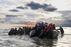 Migranci na plaży Gravelines - AFP